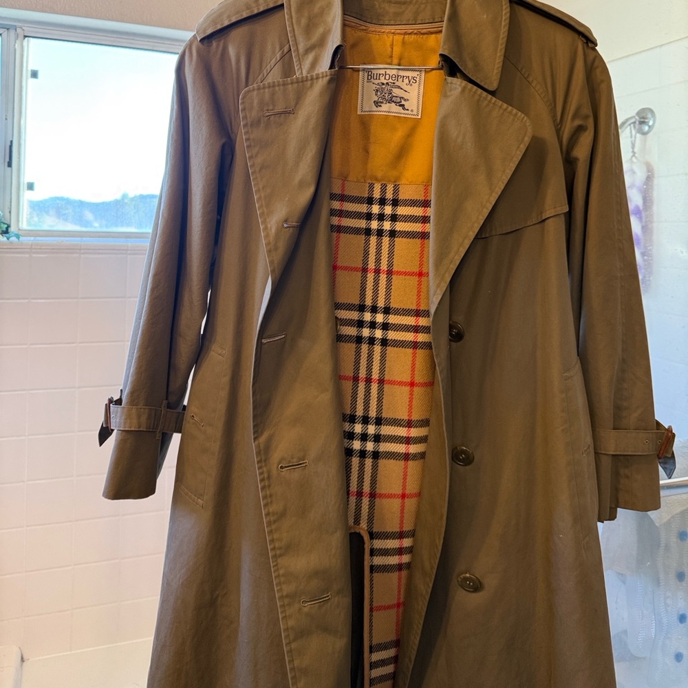 Authentic Burberry Coat with Plaid Lining.